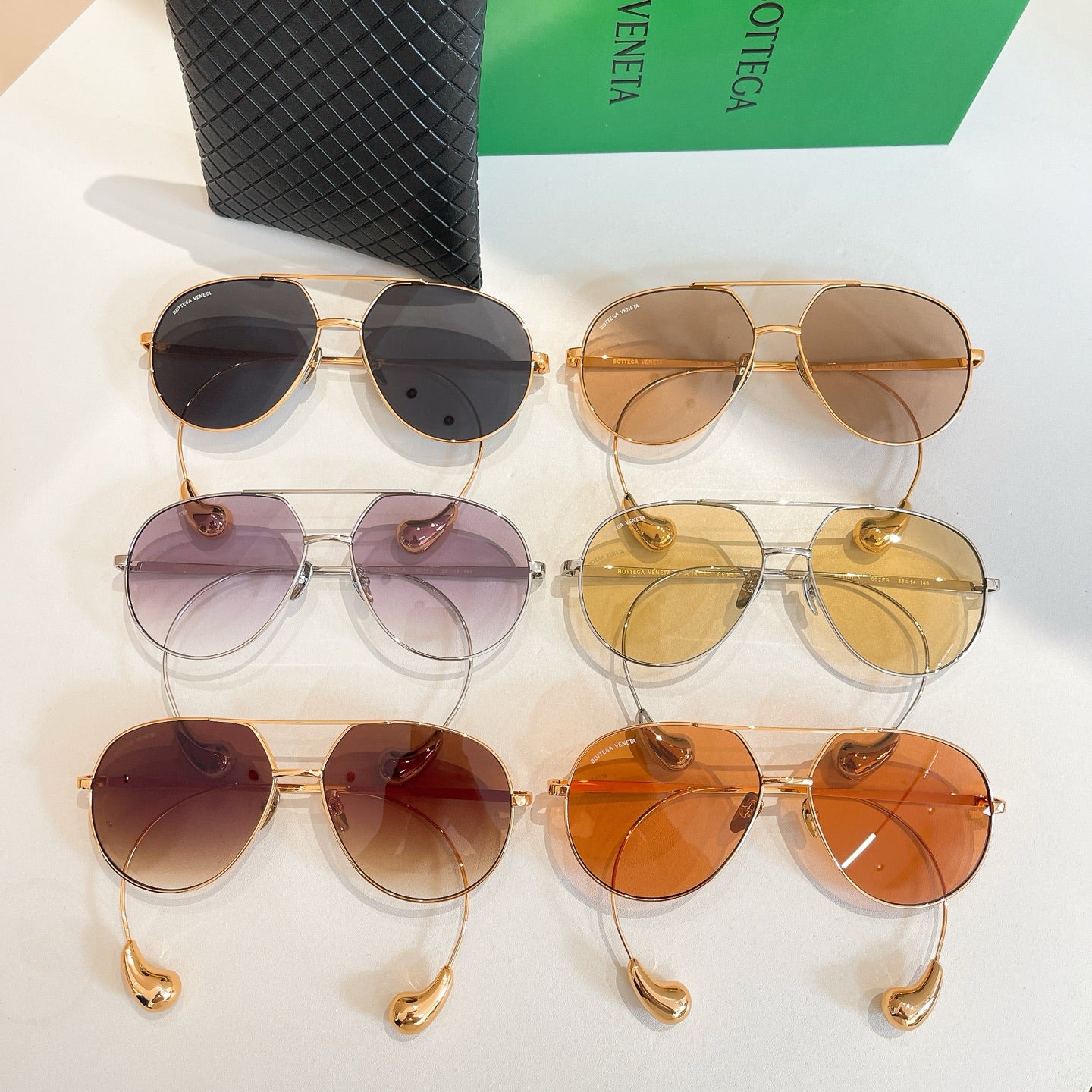 Bottega Veneta glasses assortment with gold frames and mixed tinted lenses