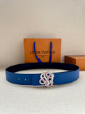 Blue leather belt with silver-toned ornate buckle detail