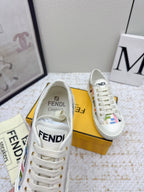 Fendi low-top sneakers close-up with Fendi logo on heel and multicolor upper trim