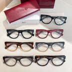 Set of seven Gucci eyeglasses with clear lenses in dark, red, and tortoise tones