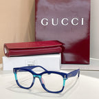 Gucci glasses with blue rectangular frames and clear lenses