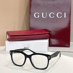 Gucci glasses with black rectangular frames and clear lenses