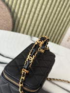 Chanel quilted mini bag top view with intertwined gold chain handles, black