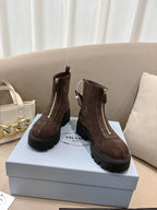Prada ladies ankle boots, dark brown suede, side zipper and rubber lug sole.