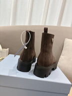 Prada ladies ankle boots, dark brown suede with thick heel and back pull loop.