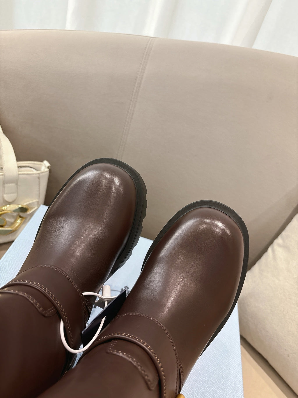 Prada ladies ankle boots, dark brown leather back view, thick rubber lug sole