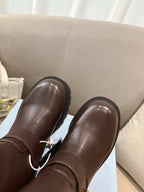 Prada ladies ankle boots, dark brown leather back view, thick rubber lug sole