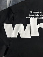 Black Off-White T-shirt back with large white 'WHI' logo across the front