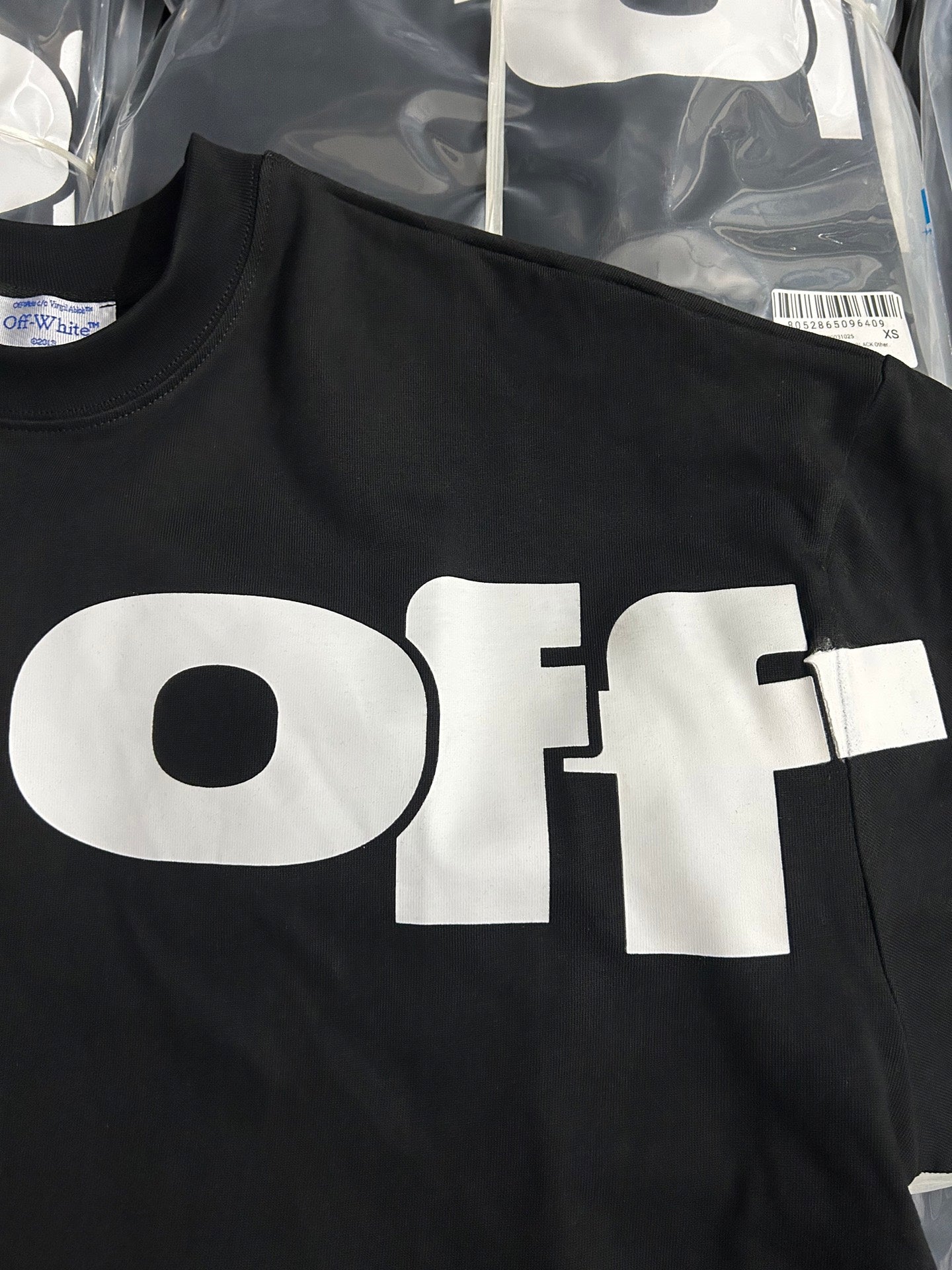Black Off-White T-shirt with oversized white 'OFF' graphic on the front