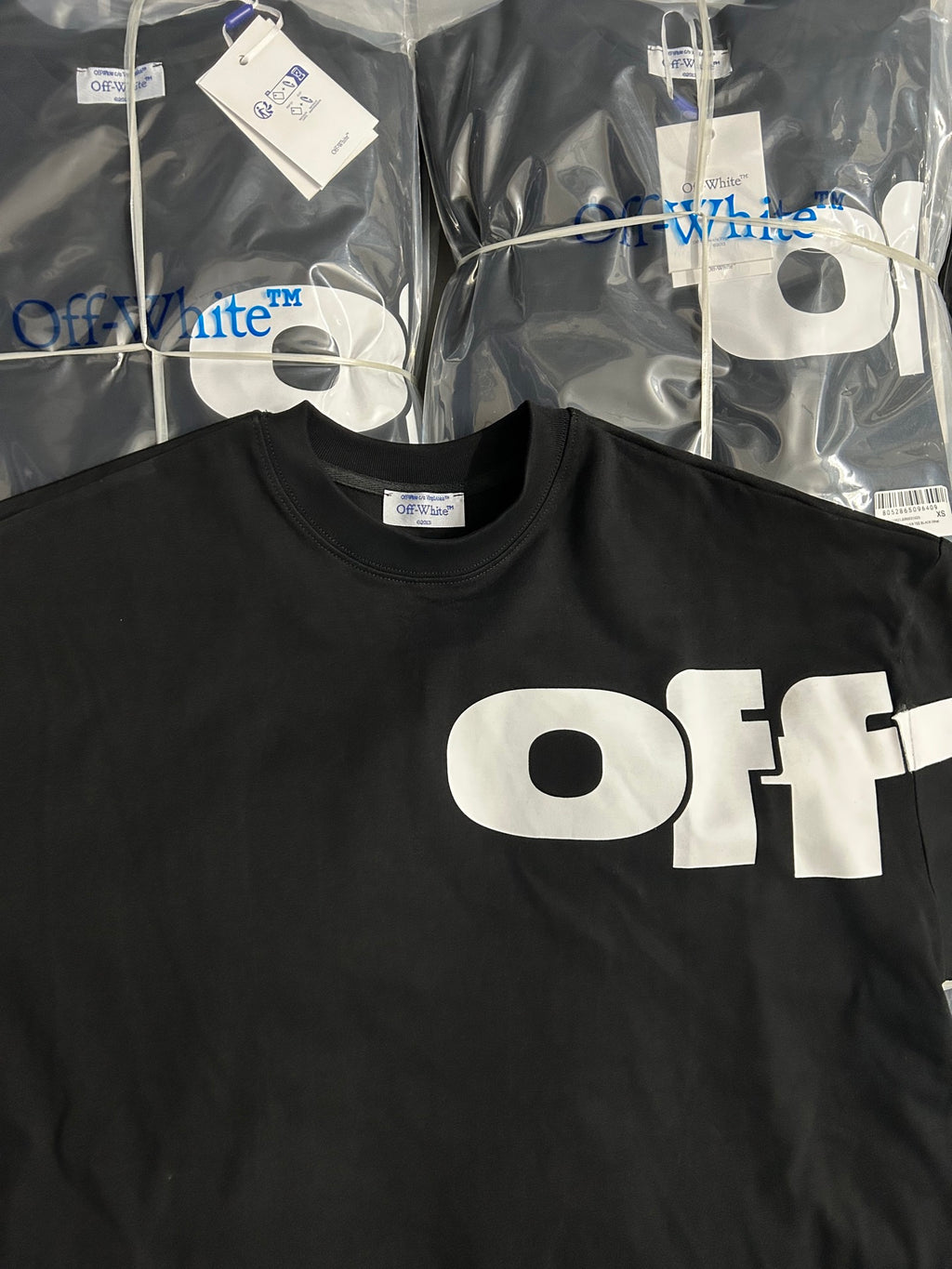 Black Off-White logo T-shirt with large white 'OFF' print across the chest
