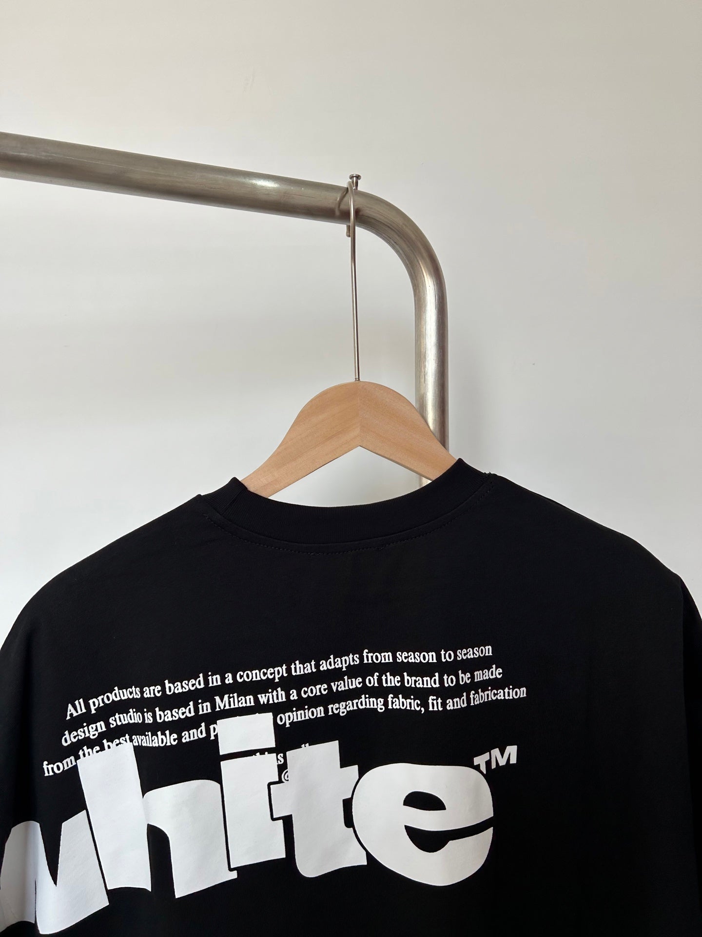 Off White T-shirt back with quote text and large white 'white' logo