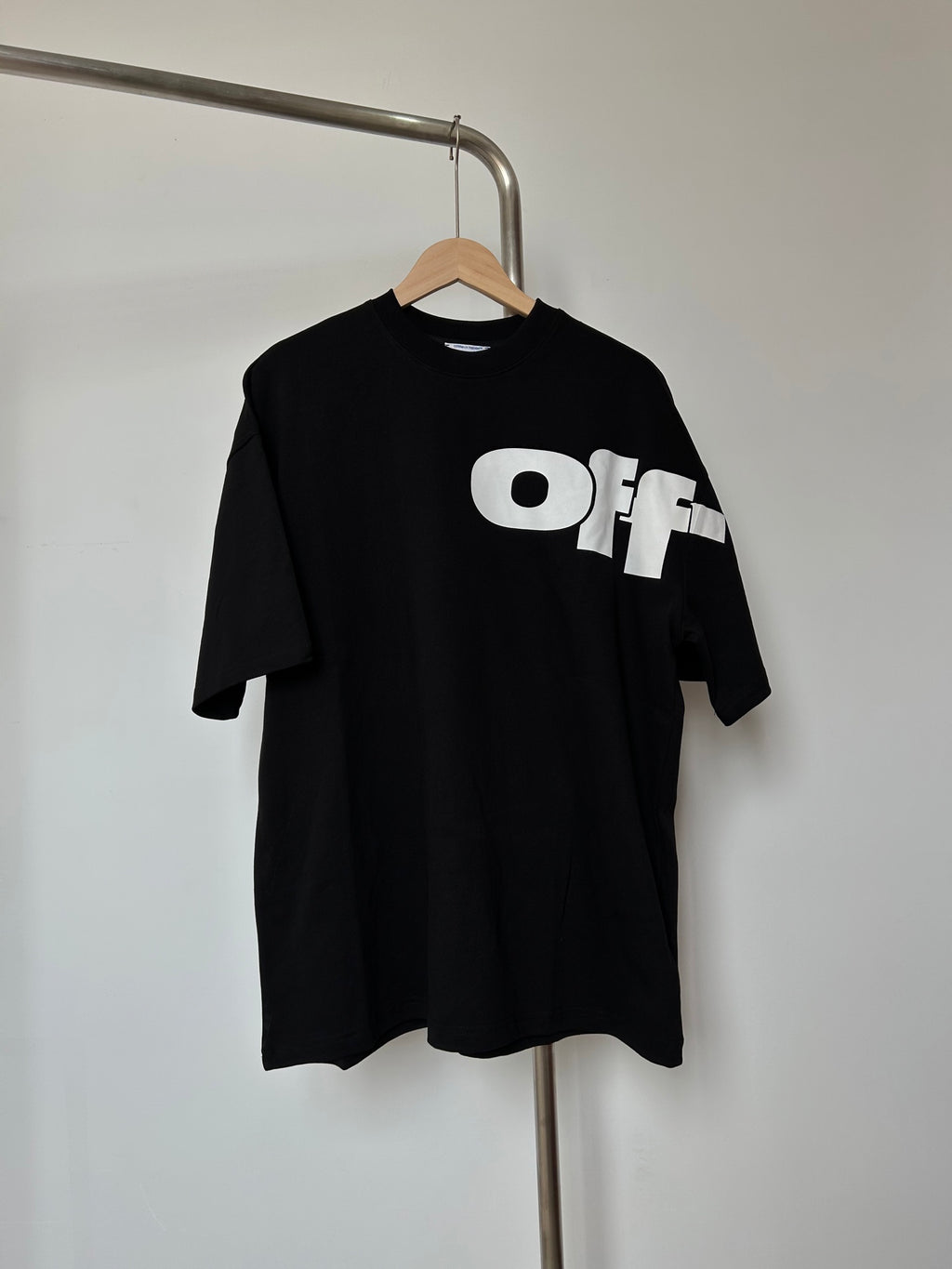 Off White T-shirt with black crew neck and white 'Off' logo front