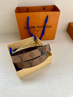 Louis Vuitton monogram belt in gift box with gold-tone LV buckle and dark strap