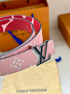 Pink monogram belt close-up showing silver LV buckle on strap
