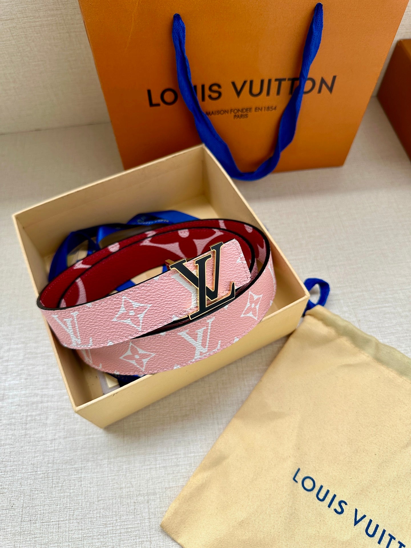 Pink monogram belt with silver LV buckle in box with dust bag