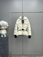 White long puffer jacket with hood, front zipper, black belt detail and logo tag