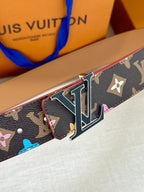 Navy monogram belt with silver LV buckle and tan lining, side close-up