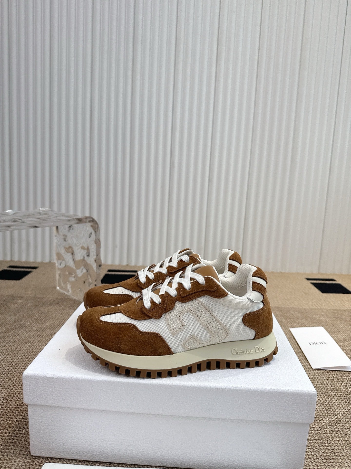 Dior unisex sneakers, brown and white colorblock with textured rubber sole.