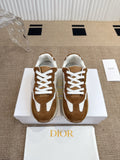 Dior unisex sneakers, brown suede with white laces and chunky rubber sole.