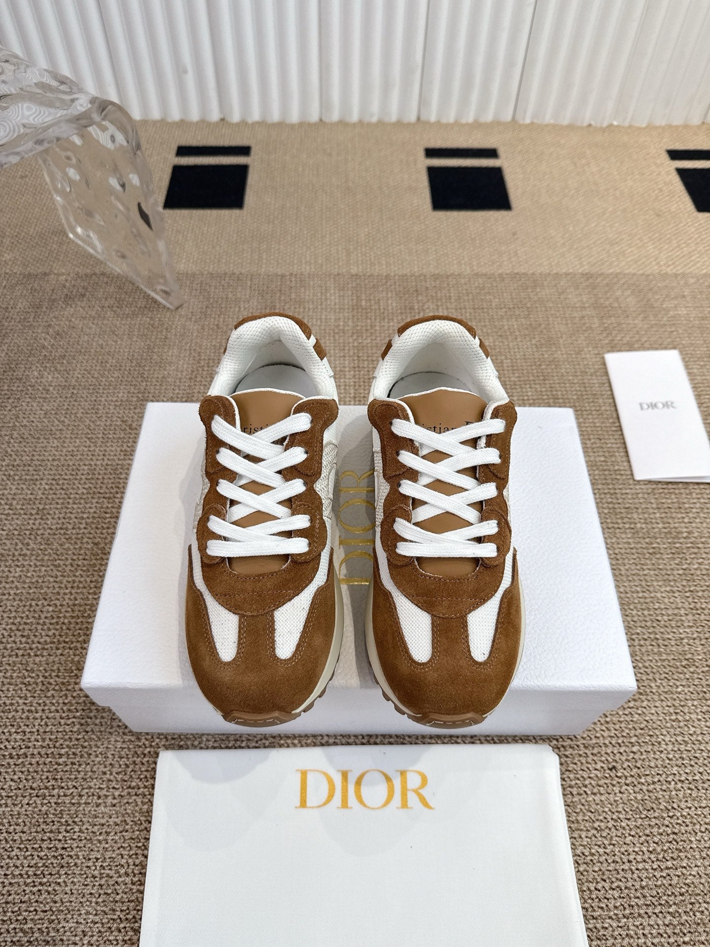 Dior unisex sneakers, brown suede with white laces and chunky rubber sole.