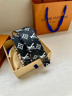 Louis Vuitton belt wrapped and stacked, dark blue with white logo monogram pattern