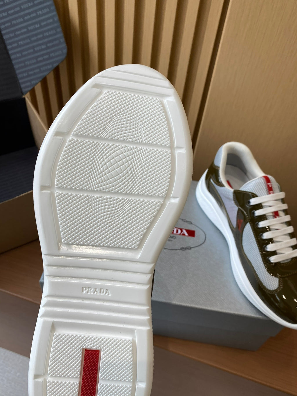 Prada unisex sneaker outsole, textured white rubber sole with Prada branding