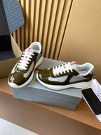 Prada unisex sneakers, olive green glossy uppers, white laces, chunky white sole