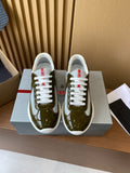 Prada unisex sneakers with white laces, olive green patent uppers, white soles