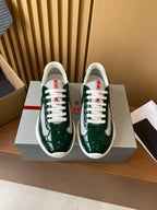 Prada unisex green sneakers with white laces and white rubber sole