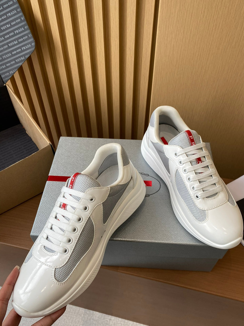 Prada unisex white and gray sneakers, textured leather upper, lace-up