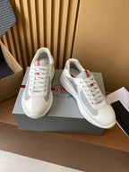 Prada unisex white and gray sneakers, red logo detail on tongue, lace-up