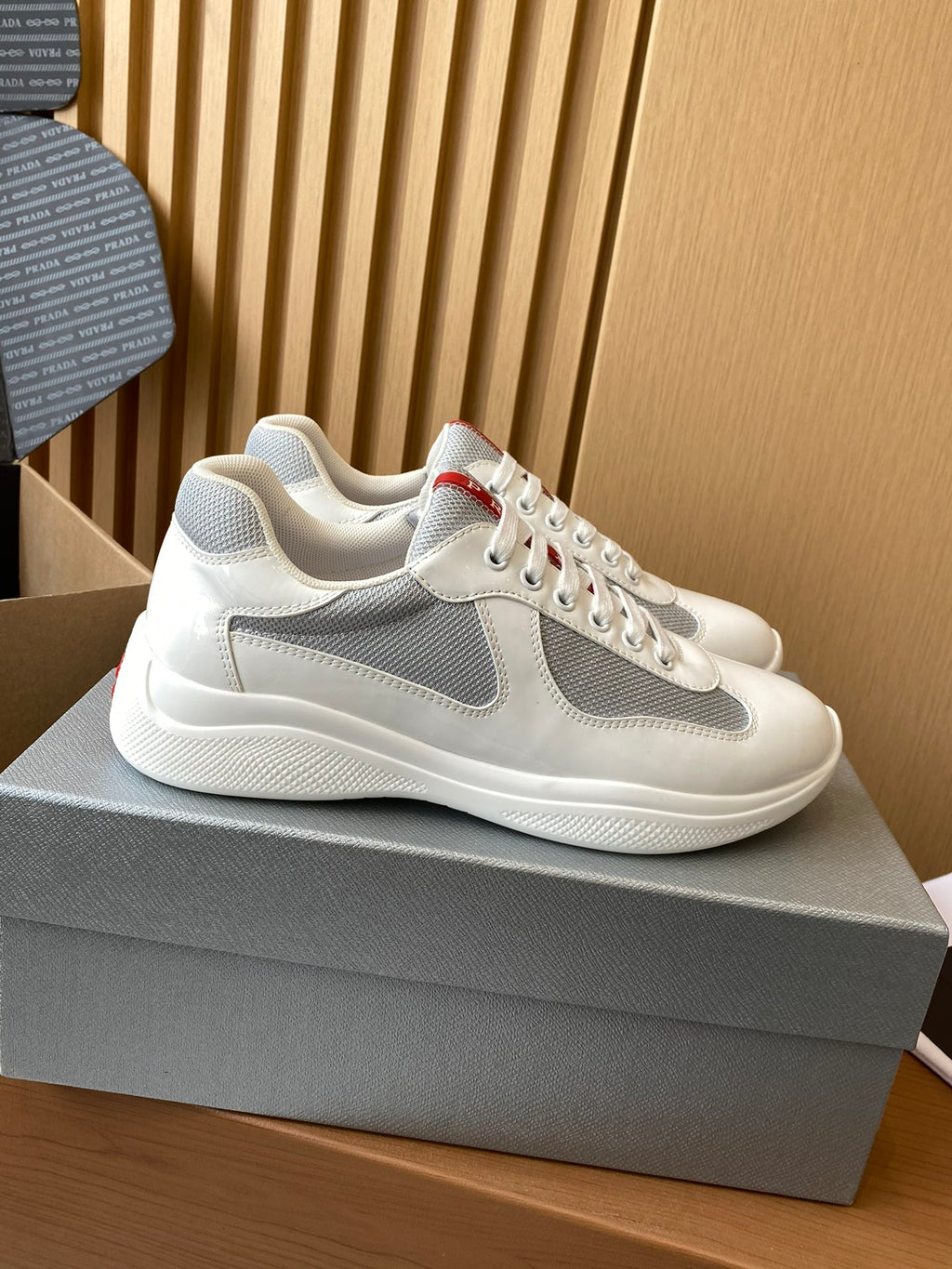 Prada unisex white and gray sneakers, mesh side panel, lace-up style