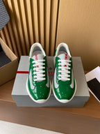 Prada unisex green patent sneakers with white laces and white rubber sole