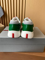 Prada unisex green sneakers with white back heel tabs and cushioned collars