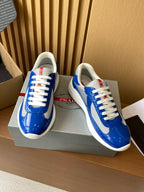 Prada unisex sneakers pair, blue with white laces and contrasting gray detail