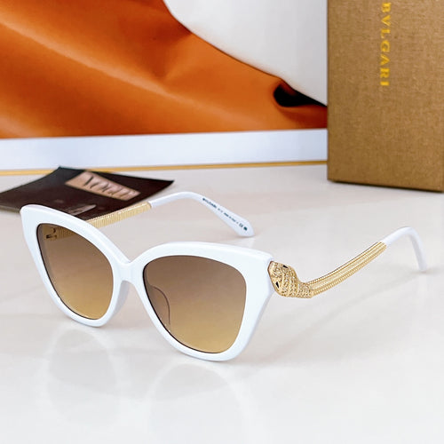 Bvlgari cat-eye sunglasses with white frames, gold chain temple details, brown lenses