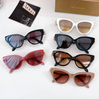 Bvlgari sunglasses assortment with multiple frames and tinted lenses, gold chain accents