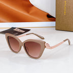 Bvlgari cat-eye sunglasses with beige frames, gold chain temple details, rose lenses