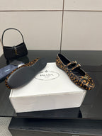 Prada leopard-print loafers with buckle strap and dark soles