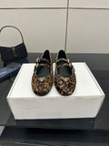 Prada ladies leopard-print flat loafers with black straps and gold-tone buckles