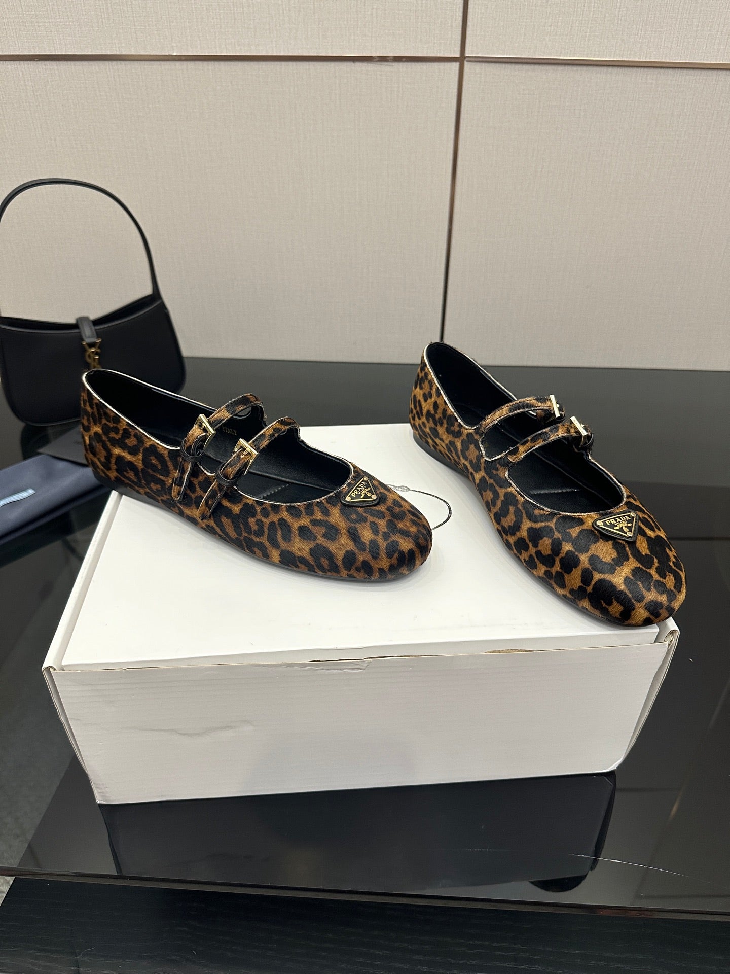 Prada ladies leopard-print loafers with double buckle strap, black topline