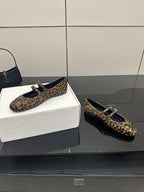 Prada leopard-print loafers, side view, gold-tone buckle and black strap