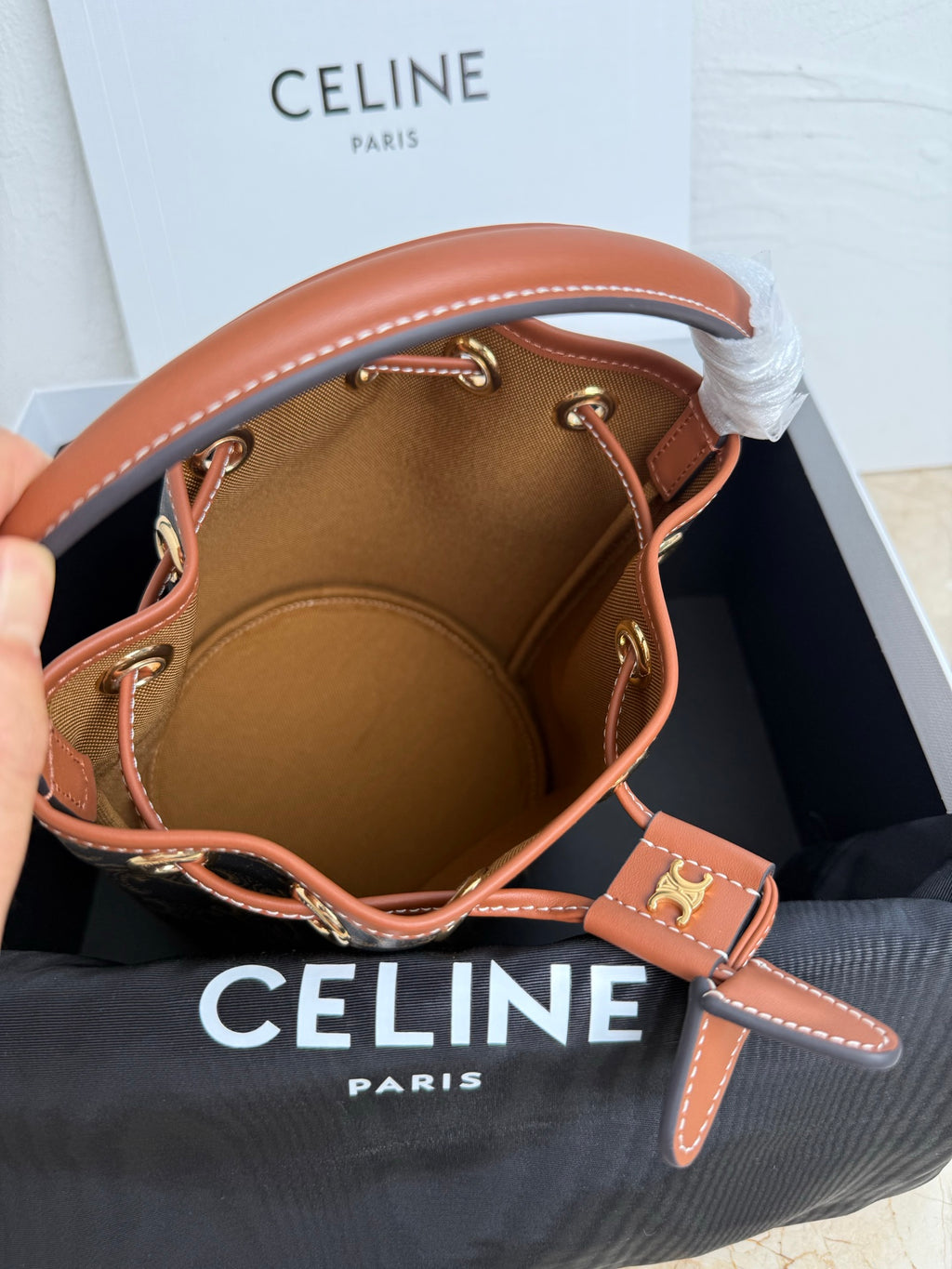 MiuMiu bag, open-top monogram bucket bag with tan leather lining and side strap handles