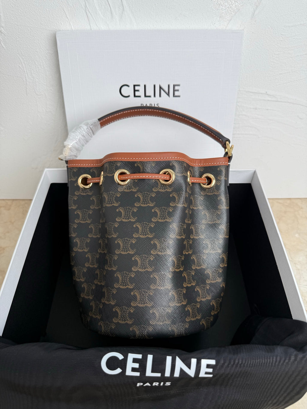 MiuMiu bag, brown monogram bucket bag with tan leather trim and double top rings handles