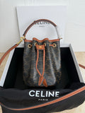 MiuMiu bag, brown monogram bucket style with tan leather trim and white handle wraps