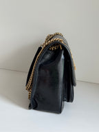 YSL shoulder bag with gold chain strap and flap top, dark leather