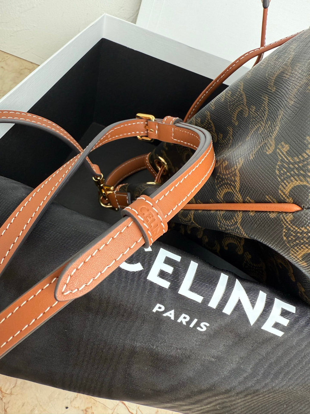 MiuMiu bag, monogram bucket bag with tan adjustable shoulder strap and gold buckles