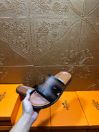 Hermes dark blue leather slide sandals held with side profile and strap label