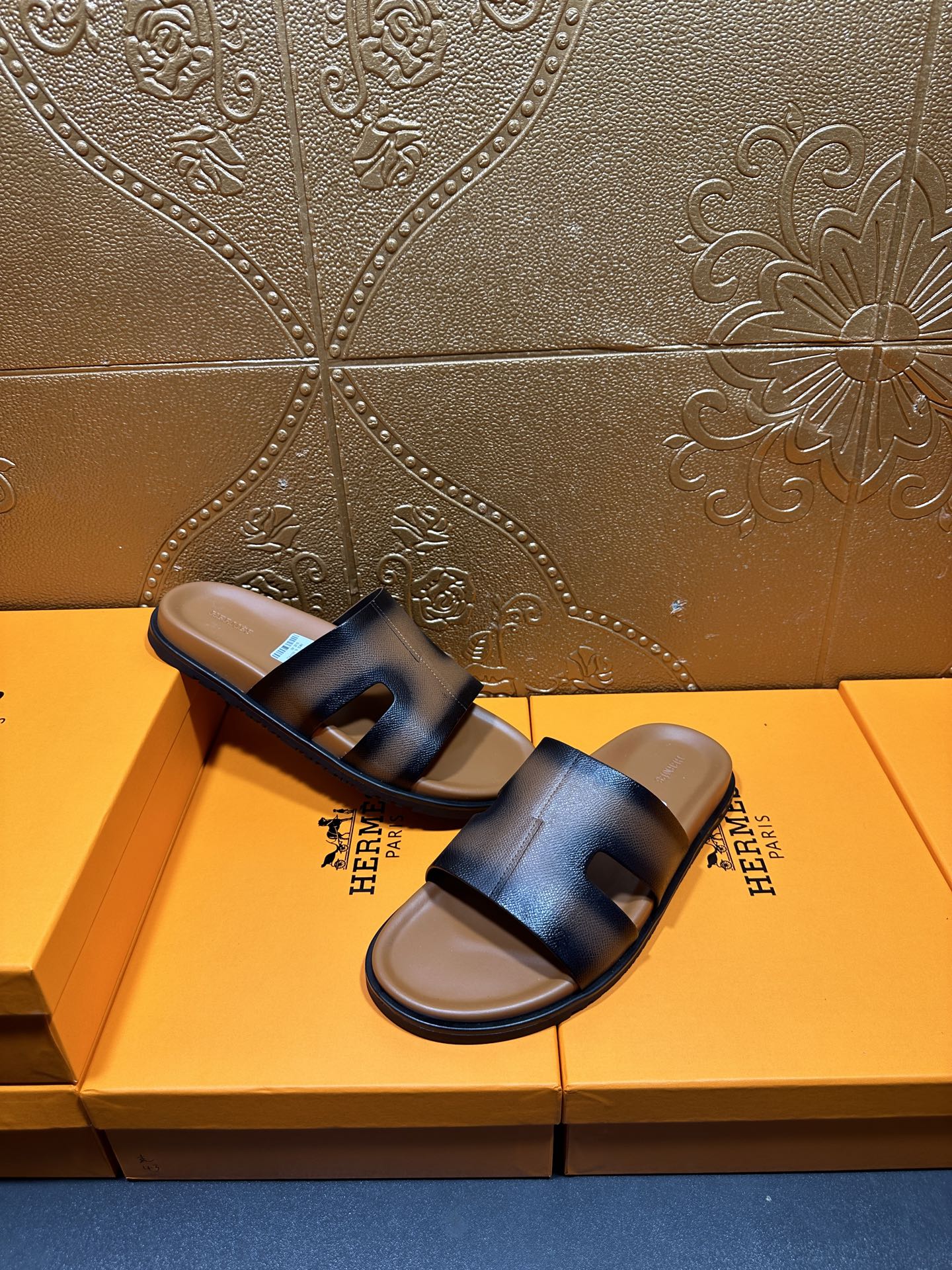 Hermes dark blue leather slide sandals with open toe and thick cushioned base