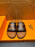 Hermes dark blue leather slide sandals with wide H-style strap, open toe